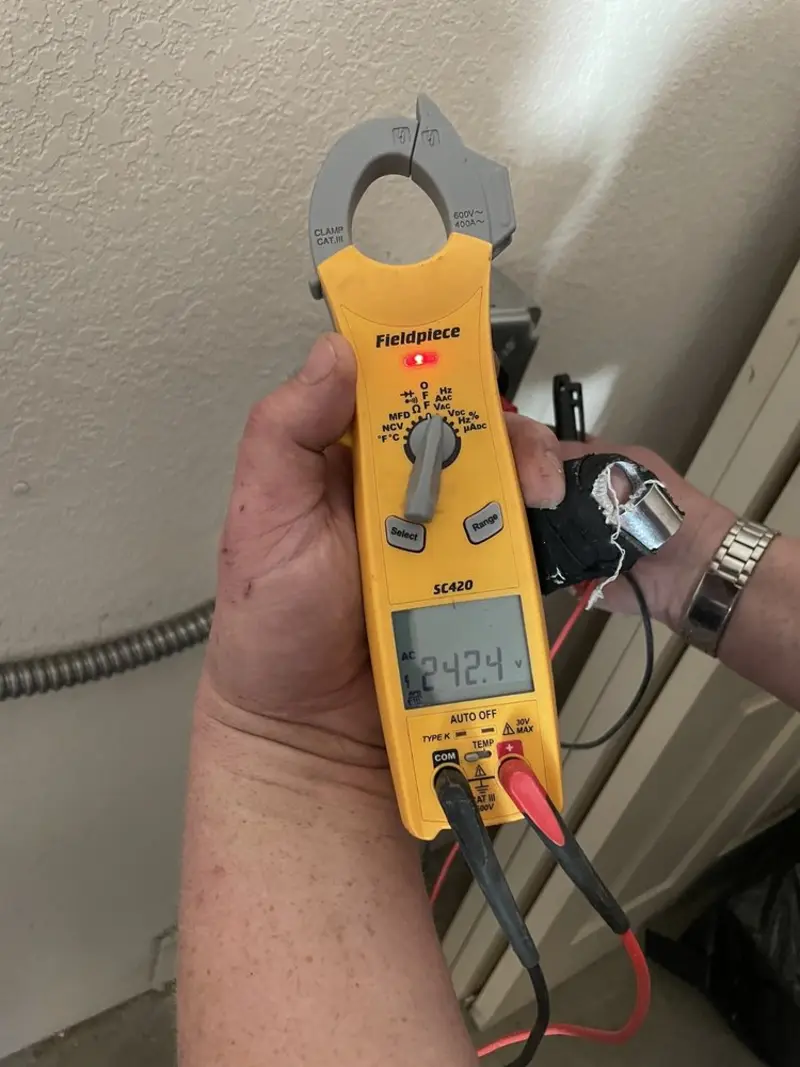 Voltage testing with clamp meter during Generator Installation in Bonita